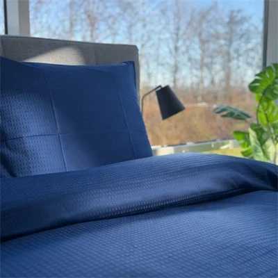 Blocks mørk blå 200x220 på redt seng